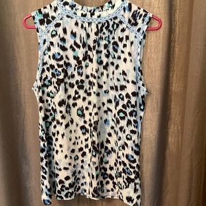 Loft brand. Sz. Medium sleeveless mixed medium top. High neck with back button